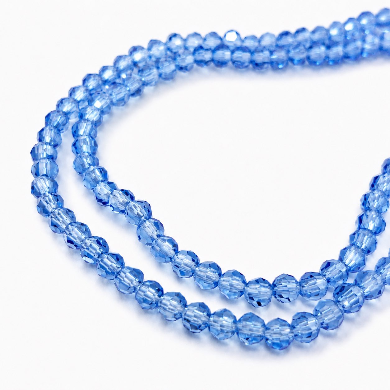 Strand of Cornfield Blue Faceted Glass Beads - Size 4mm