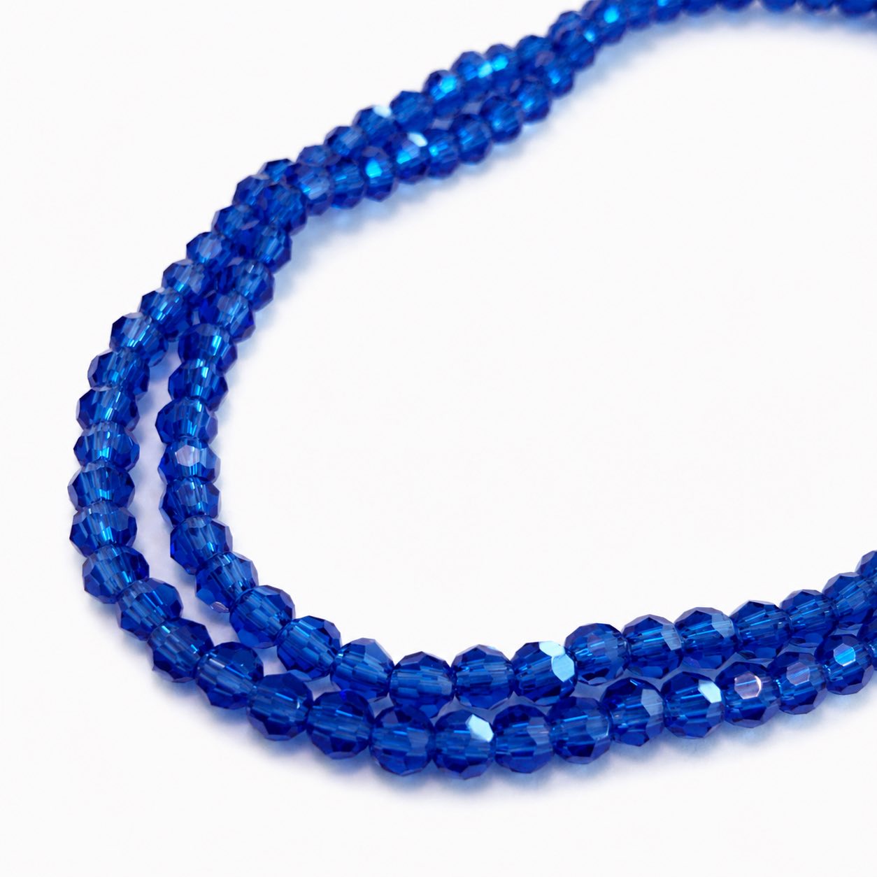 Strand of Royal Blue Faceted Glass Beads - Size 4mm