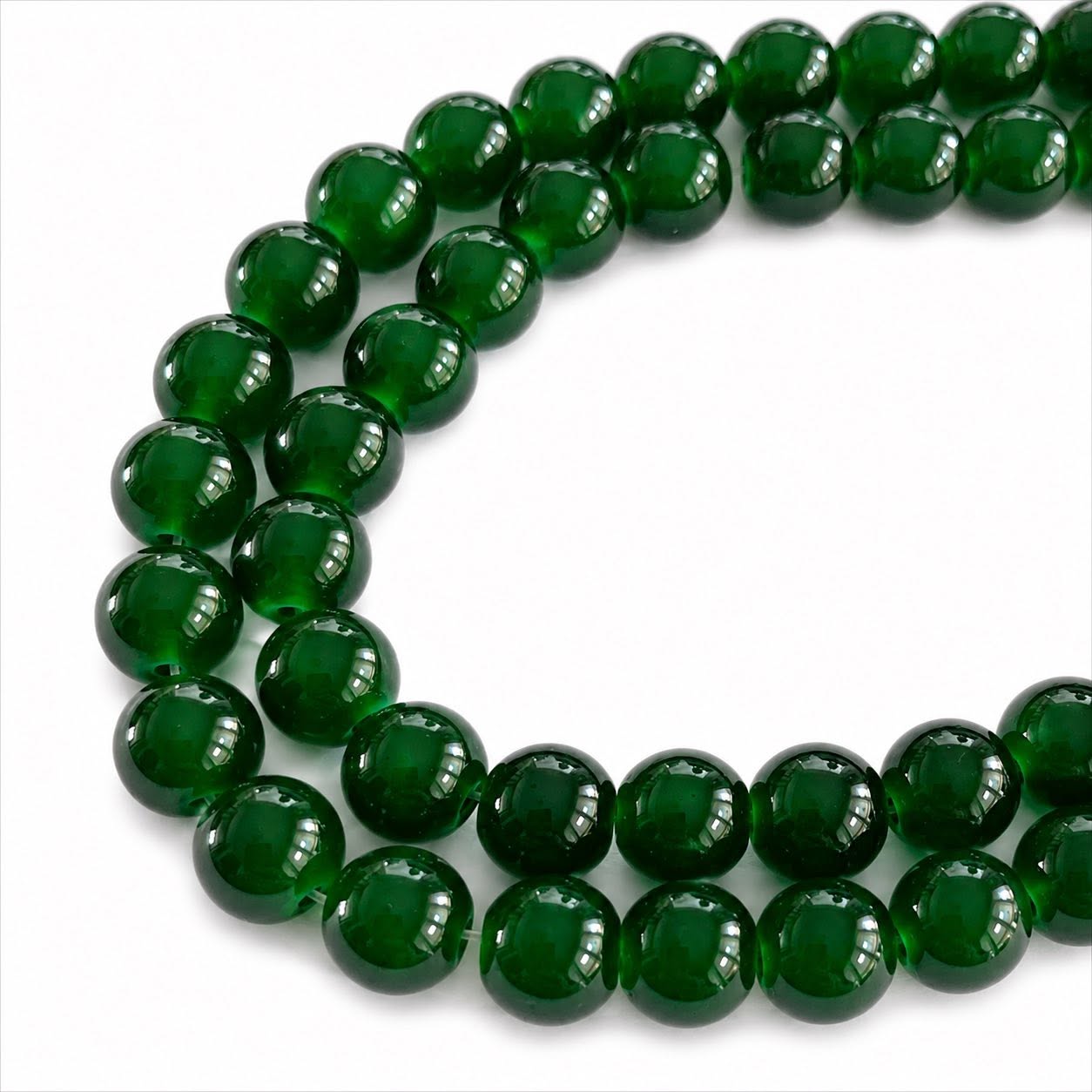 Strand of Dark Green Glass Beads - Size 8mm