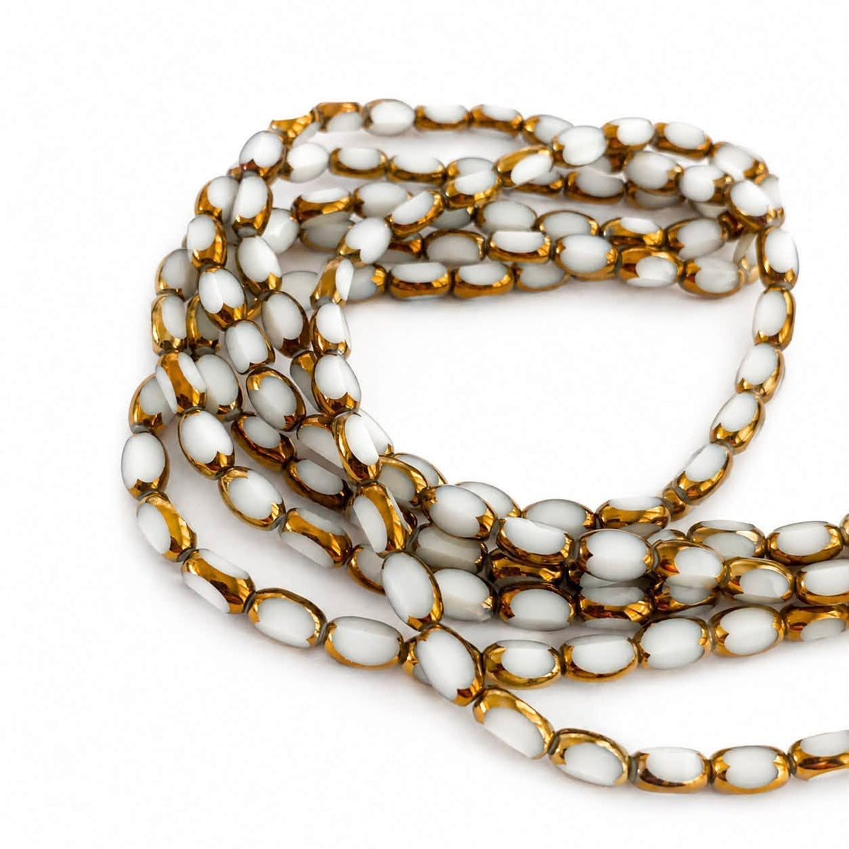 Strand of Glass Beads With Golden Edge - Size 8x5mm