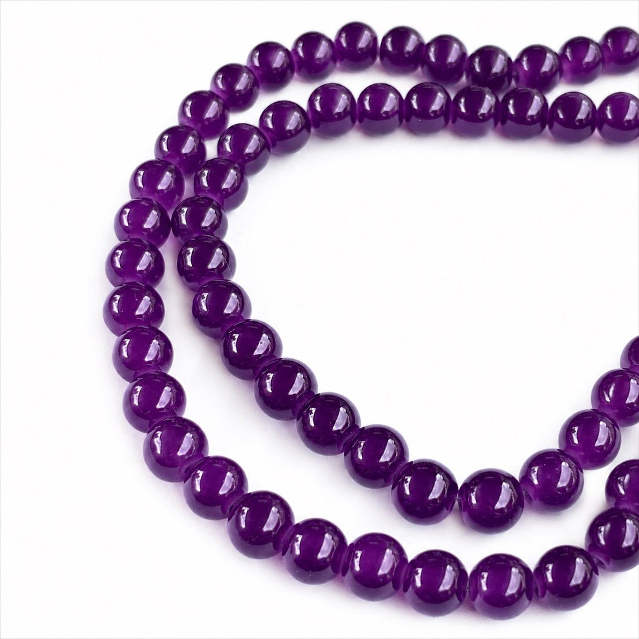 Strand of Deep Purple Glass Beads - Size 8mm