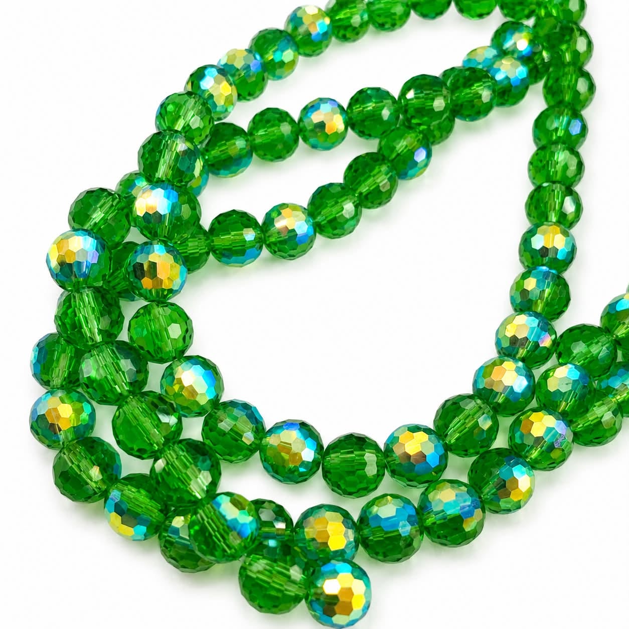 Strand of Faceted Green Glass Beads - 8mm
