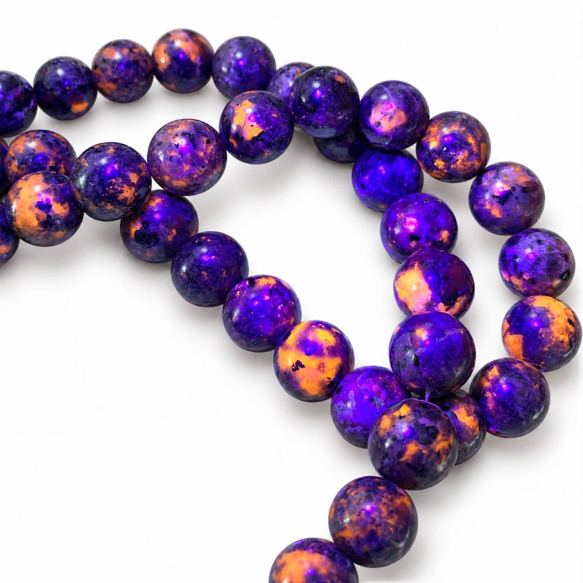 Strand of Yooperlite Stone Beads – 12mm UV-Reactive Glow Beads